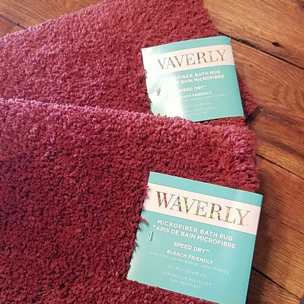 2 NWT bath rugs.